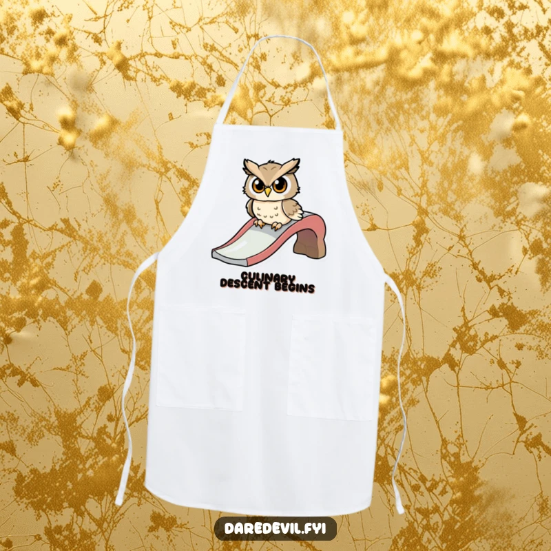 Funny apron showing a determined owl character preparing to slide down a playground slide, ready for kitchen fun.