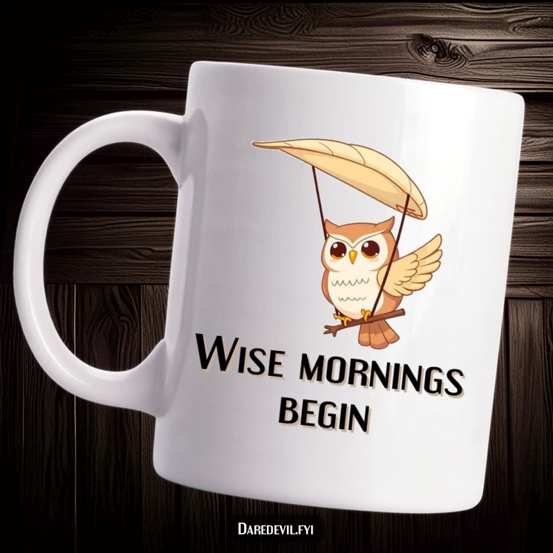 Funny mug depicting a contented owl character peacefully paragliding through the sky using a large feather as a wing, conveying joy and freedom.