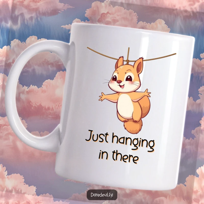 Funny squirrel mug featuring a perky squirrel dangling precariously from a thin thread with outstretched paws, looking comically stressed.