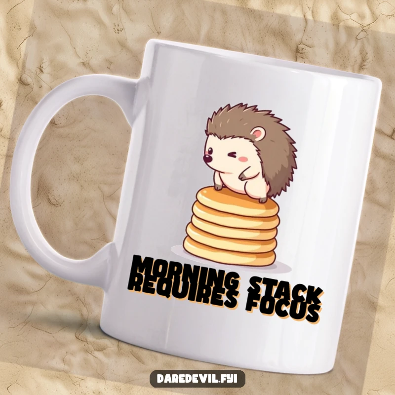 Funny hedgehog mug: a tiny creature precariously balancing on a tall, wobbly stack of pancakes, looking determined.