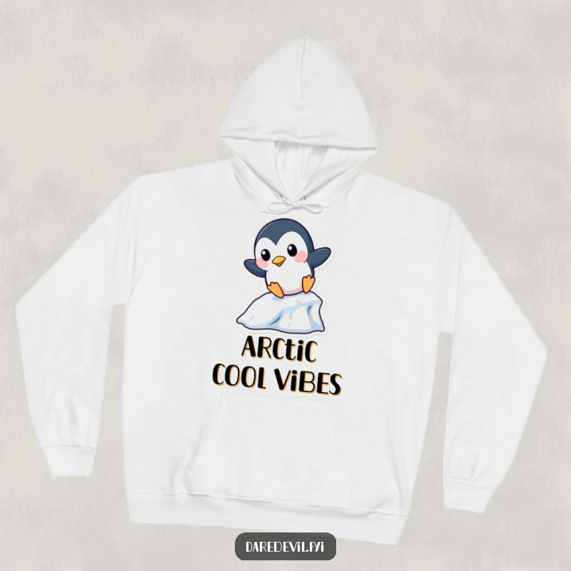 Funny Penguin Hoodie: A playful penguin character boldly slides down a miniature icicle, offering cozy comfort and winter humor.