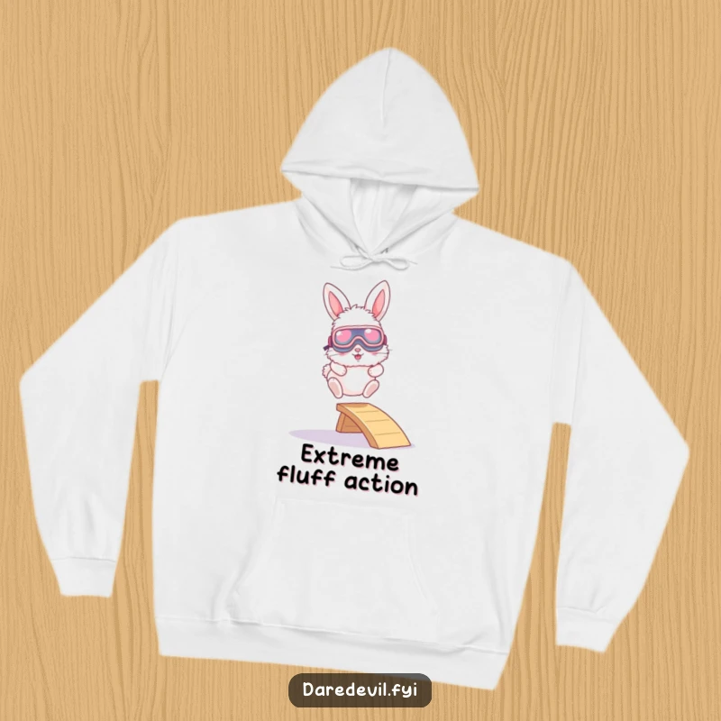 Funny hoodie with a fluffy bunny wearing large goggles, captured mid-leap from a small ramp, radiating fun and excitement.