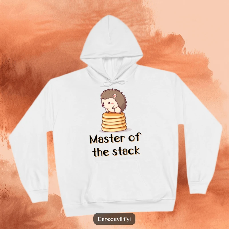 Funny hedgehog hoodie: a small, determined hedgehog balancing bravely atop a teetering stack of fluffy pancakes.