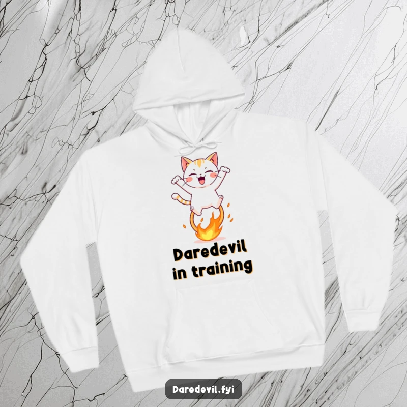 Funny hoodie depicting a mischievous cat character leaping over a vibrant, fiery hoop with an expression of pure, unadulterated glee.