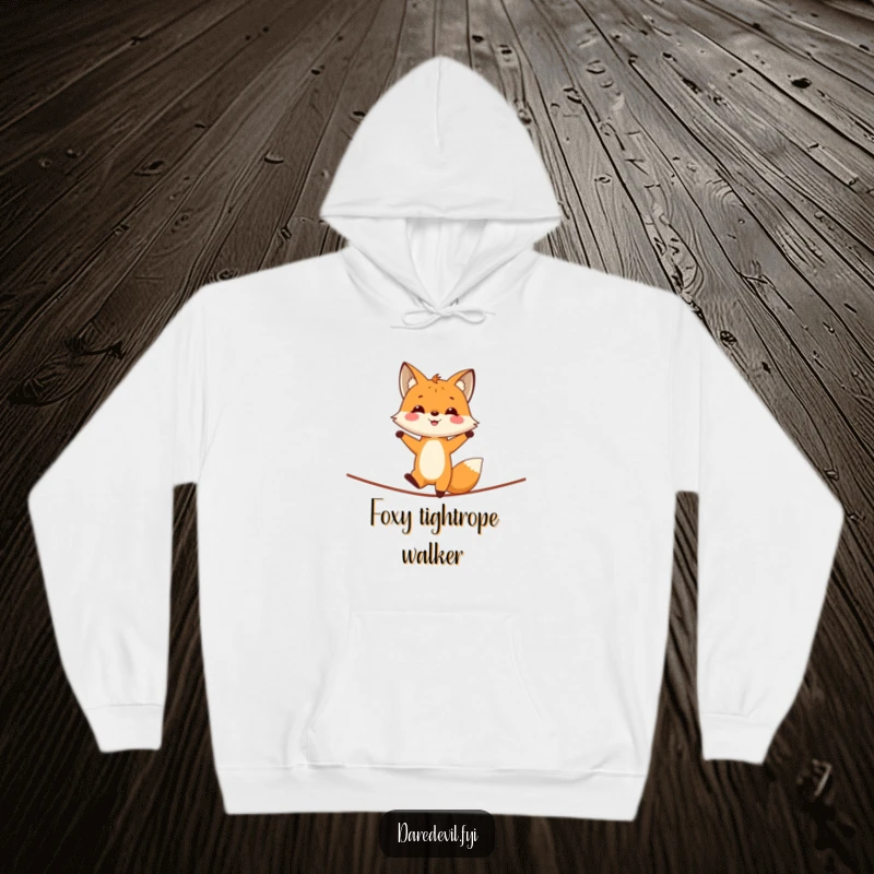 Funny fox in a handstand on a tightrope, depicted on a cozy hoodie, perfect for fans of circus arts.