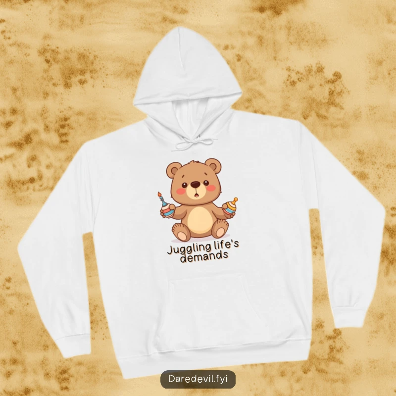 Funny Bear Hoodie showcasing a bear cub hilariously attempting to juggle, symbolizing playful struggle and cozy comfort.