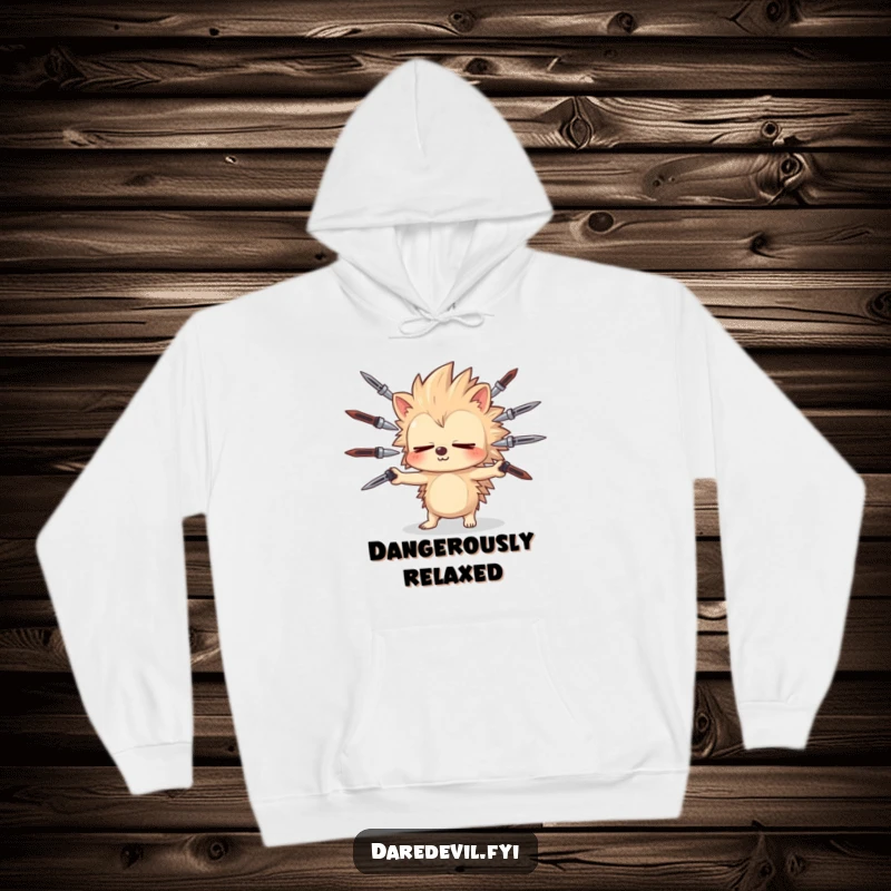 Funny sleepy hedgehog juggles sharp objects, a comical display of danger perfect for a funny hoodie.