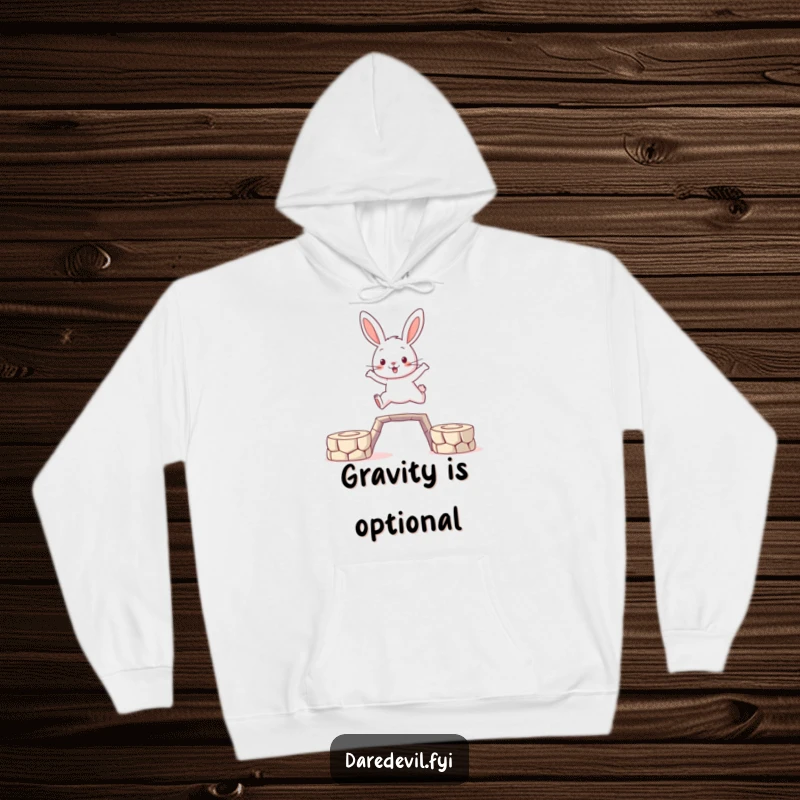 Funny Rabbit Hoodie: A brave rabbit character makes a daring leap between platforms, embodying courage and adventure in soft comfort.