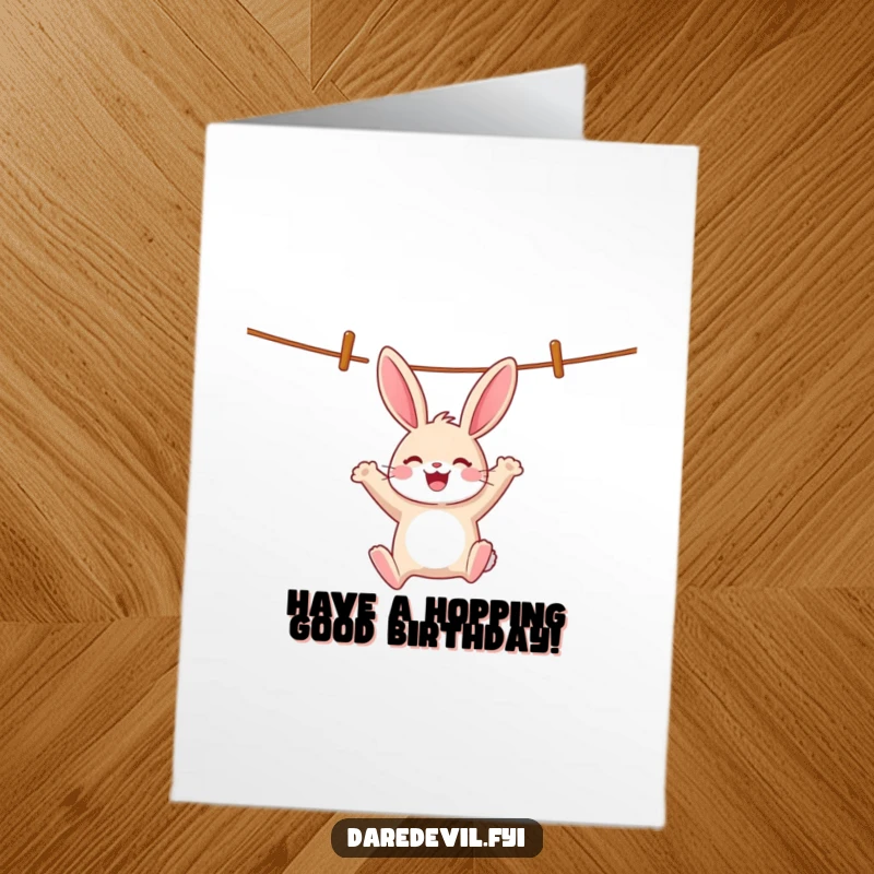 Funny Free Printable Birthday Card: Cheerful rabbit swinging wildly from a clothesline with a whoop, a fun gift.
