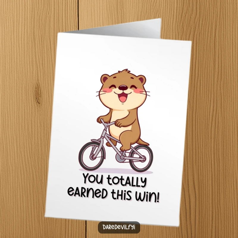 Funny Free Printable Congrats Card: Triumphant otter on a bicycle, a humorous downloadable gift.