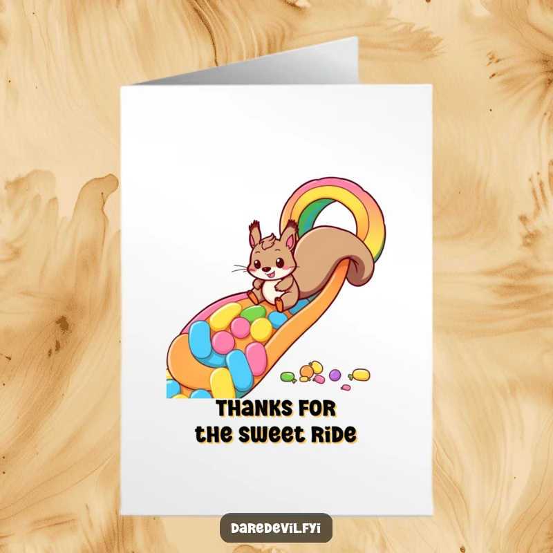 Funny Free Printable Squirrel Thank You Card with a playful squirrel sliding down a candy rainbow, expressing gratitude.
