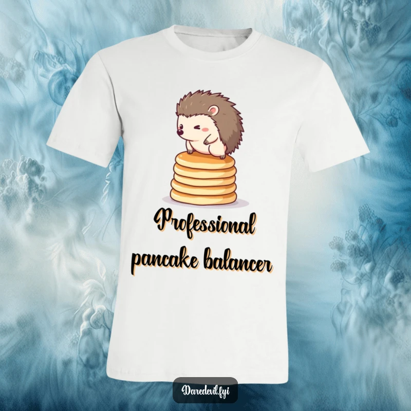 Funny hedgehog t-shirt: a tiny hedgehog heroically balancing on a towering stack of golden brown pancakes.