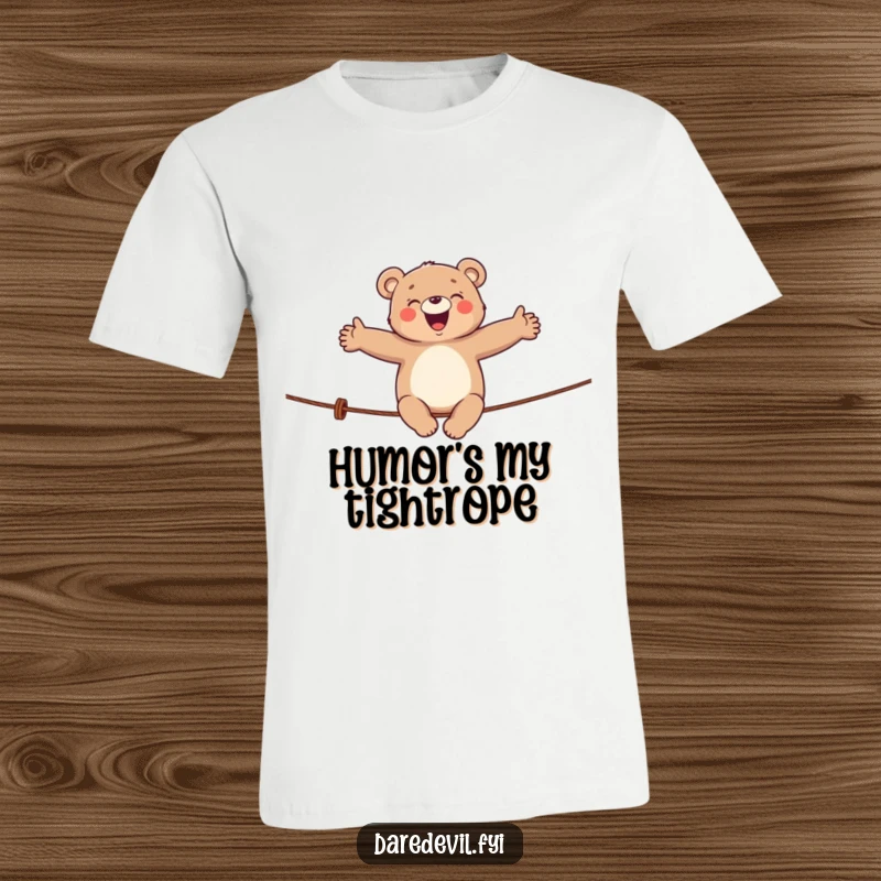Funny bear t-shirt depicting a giggling bear carefully balancing on a tightrope, perfect for circus lovers.