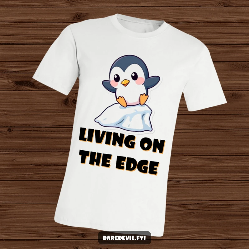 Funny Penguin T-Shirt: A playful penguin character boldly slides down a miniature icicle, showcasing wintery fun and humorous action.