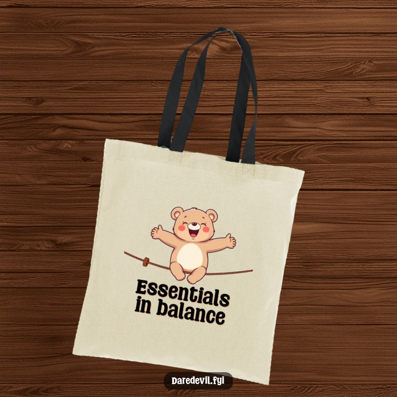 Funny bear tote bag with a giggling bear balancing on a tightrope, great for carrying essentials with humor.
